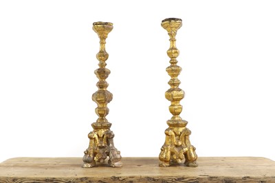 Lot 297 - A pair of Italian giltwood pricket candlesticks