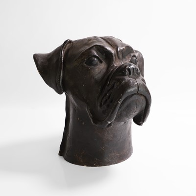 Lot 288 - A painted plaster head of a boxer dog