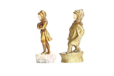 Lot 142 - Two gilt-bronze and ivory figures