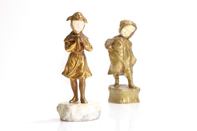 Lot 142 - Two gilt-bronze and ivory figures