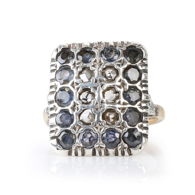 Lot 162 - A diamond and sapphire panel ring