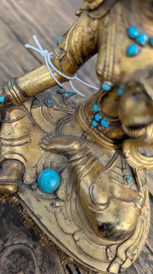 Lot 125 - A gilt-bronze bodhisattva