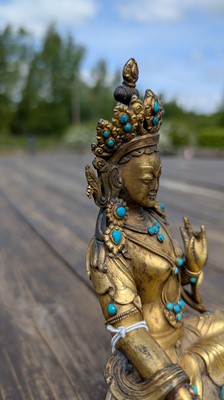 Lot 125 - A gilt-bronze bodhisattva