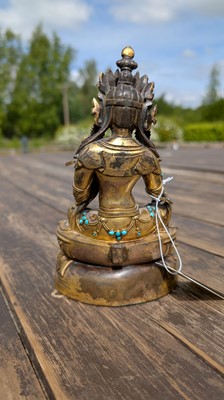 Lot 125 - A gilt-bronze bodhisattva
