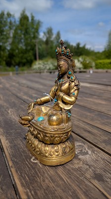 Lot 125 - A gilt-bronze bodhisattva