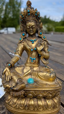 Lot 125 - A gilt-bronze bodhisattva