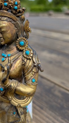 Lot 125 - A gilt-bronze bodhisattva
