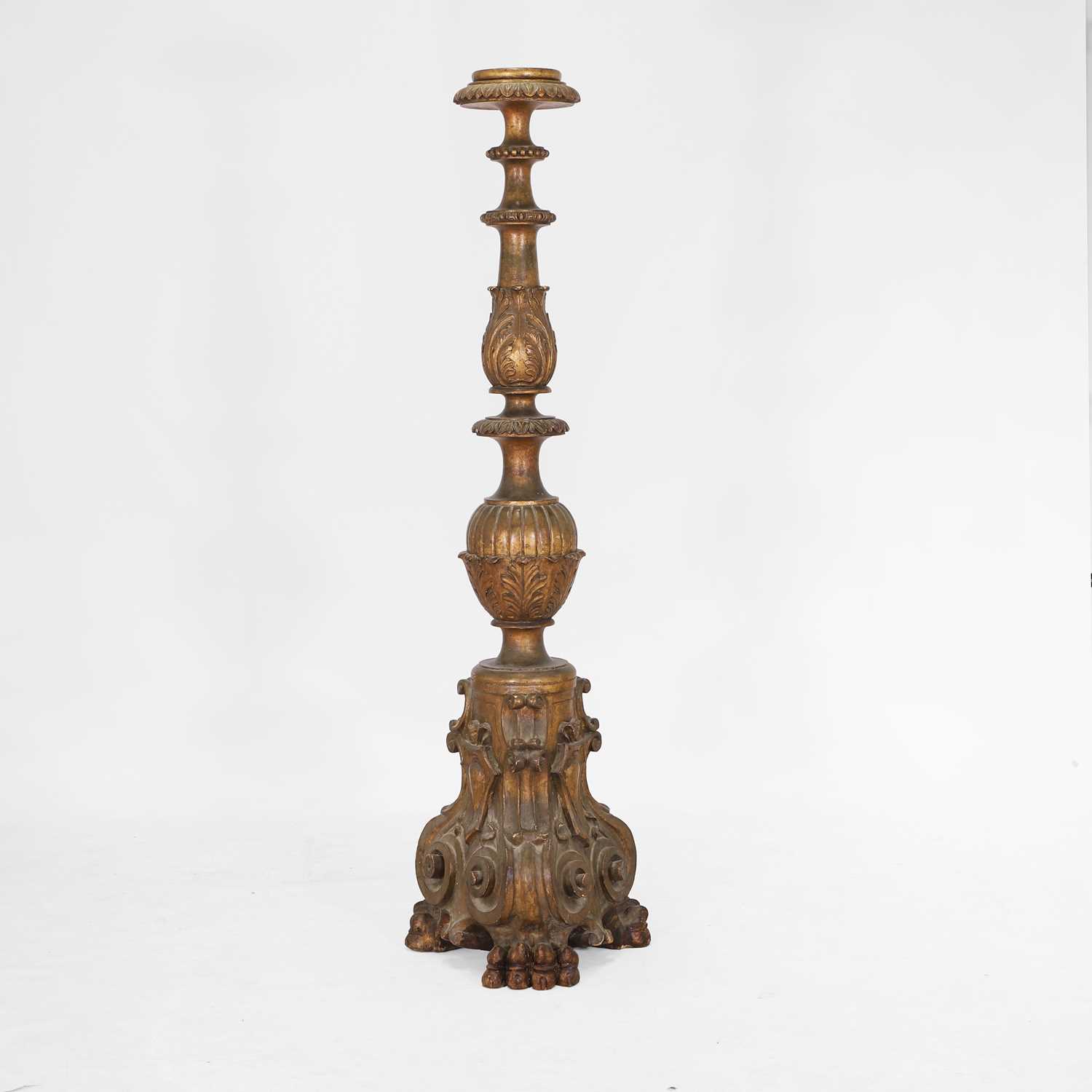 Lot 107 - A carved and gilt torchère