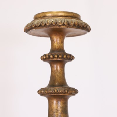 Lot 107 - A carved and gilt torchère