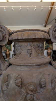 Lot 39 - A neoclassical terracotta urn by Jean Garouste