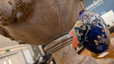 Lot 39 - A neoclassical terracotta urn by Jean Garouste