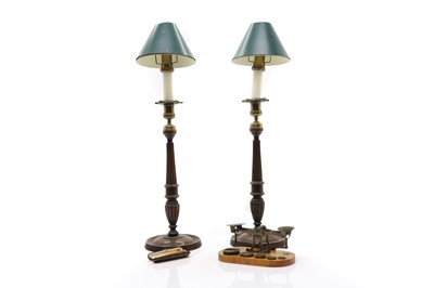 Lot 298 - A pair of George III style mahogany candlestick lamps