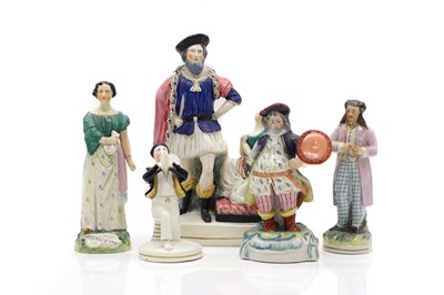 Lot 141 - A collection of Staffordshire pottery theatrical figures