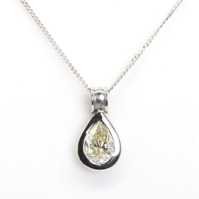 Lot 164 - † A white gold mounted fancy coloured diamond drop shaped pendant