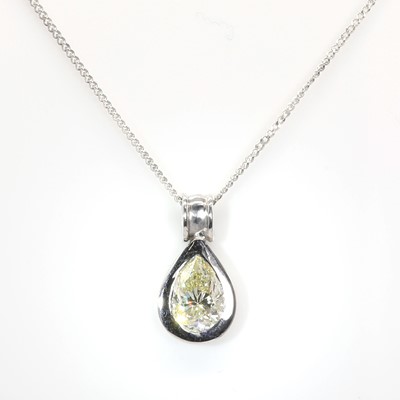 Lot 164 - † A white gold mounted fancy coloured diamond drop shaped pendant