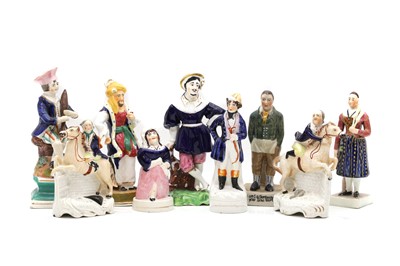 Lot 149 - A collection of Staffordshire pottery theatrical figures