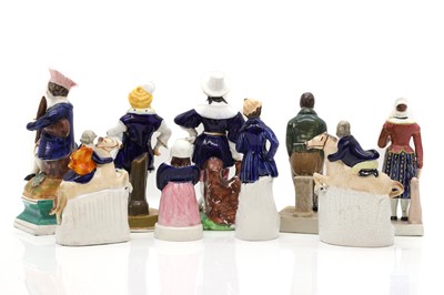 Lot 149 - A collection of Staffordshire pottery theatrical figures