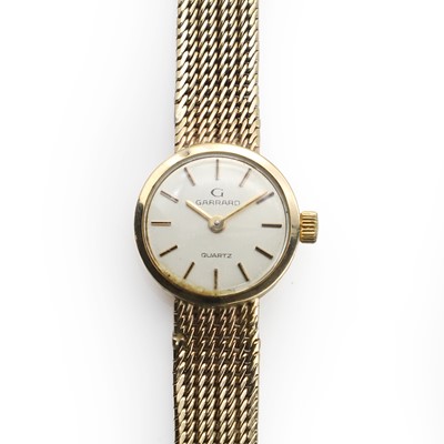 Lot 561 - A ladies' 9ct gold Garrard quartz bracelet watch