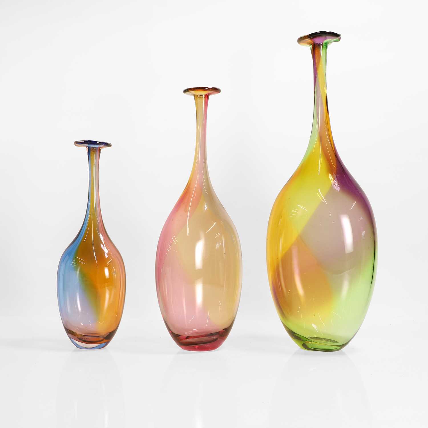 Lot 348 - Three 'Fidji' bottle vases by Kosta Boda