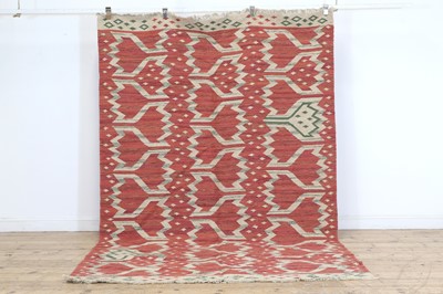 Lot 451 - A kilim flatweave carpet of Scandinavian design