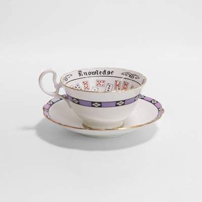 Lot 168 - A fortune teller's tea-leaf divination cup and saucer