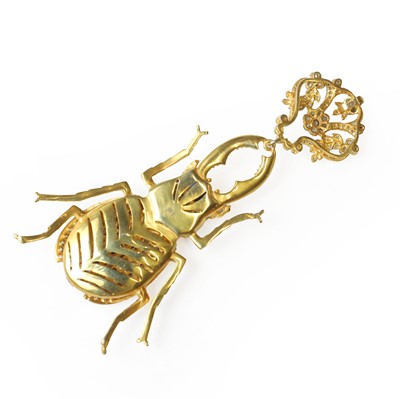 Lot 178 - A silver gilt sapphire and diamond stag beetle pendant