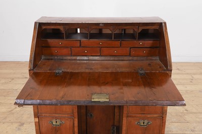 Lot 439 - A George I yew and walnut pedestal bureau