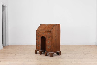 Lot 439 - A George I yew and walnut pedestal bureau