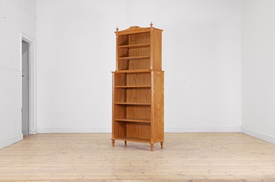 Lot 404 - A George III-style satinwood open bookcase