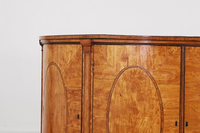 Lot 435 - A George III Sheraton period satinwood and tulipwood demilune side cabinet