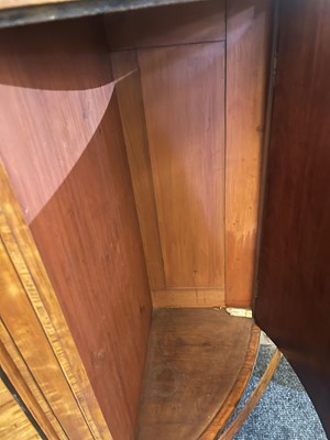 Lot 435 - A George III Sheraton period satinwood and tulipwood demilune side cabinet