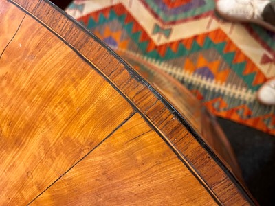 Lot 435 - A George III Sheraton period satinwood and tulipwood demilune side cabinet