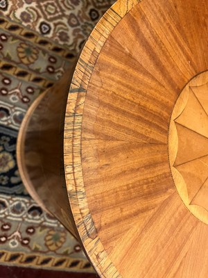 Lot 423 - A set of three George III-style satinwood stands