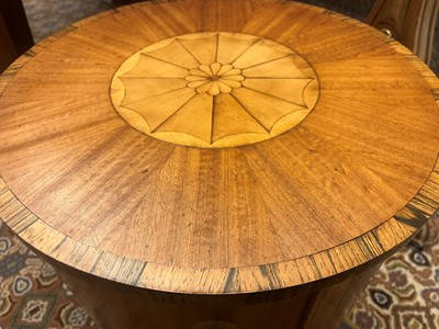 Lot 423 - A set of three George III-style satinwood stands