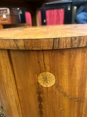 Lot 423 - A set of three George III-style satinwood stands