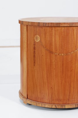 Lot 423 - A set of three George III-style satinwood stands