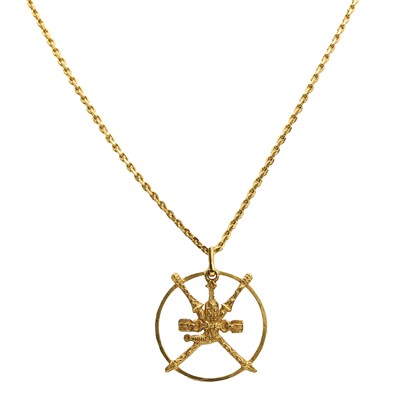 Lot 506 - A gold Omani coat of arms pendant and chain