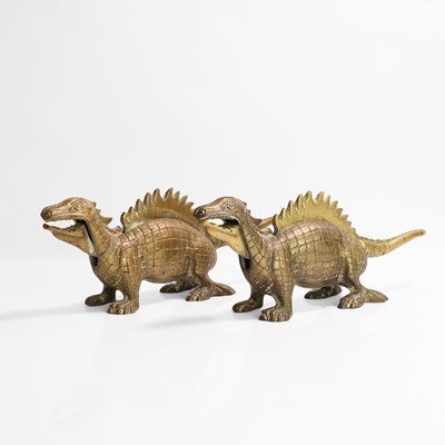 Lot 20 - A pair of large dinosaur brass nutcrackers