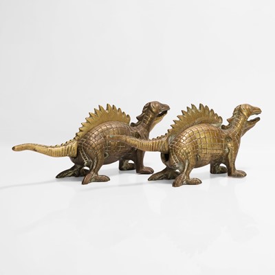 Lot 20 - A pair of large dinosaur brass nutcrackers