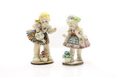 Lot 302 - A pair of Italian porcelain figures