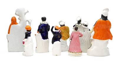 Lot 150 - A group of seven Staffordshire pottery theatrical figures