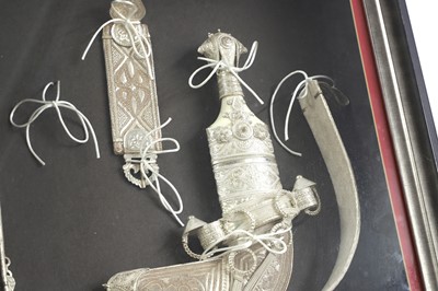 Lot 58 - A framed silver khanjar and belt