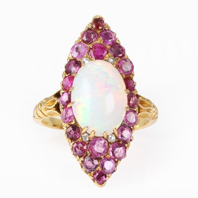 Lot 92 - An opal, ruby and pink sapphire marquise form ring