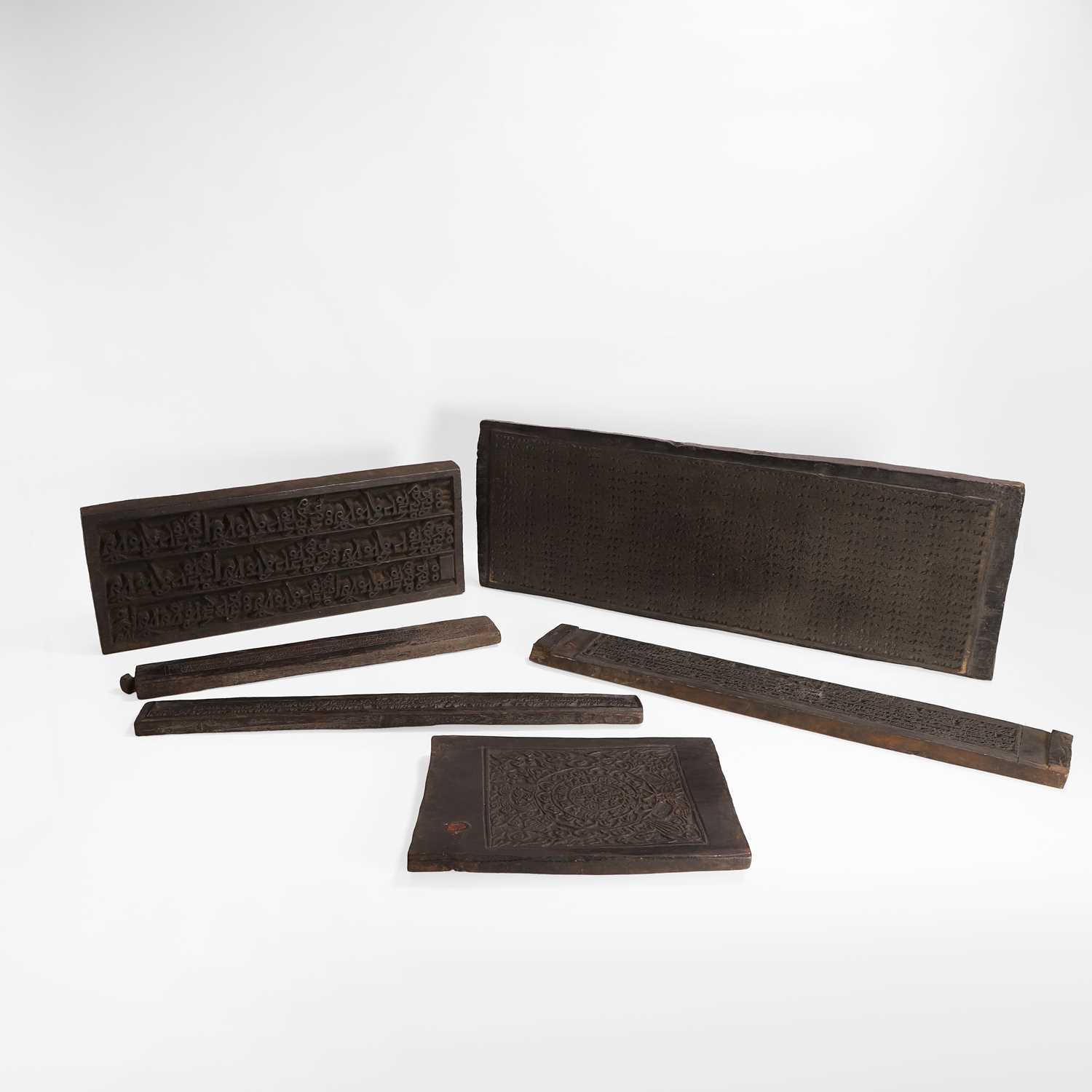 Lot 576 - A collection of six prayer printing blocks