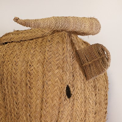 Lot 586 - A life-sized woven seagrass bull's head