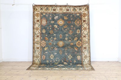 Lot 431 - A hand knotted Agra carpet