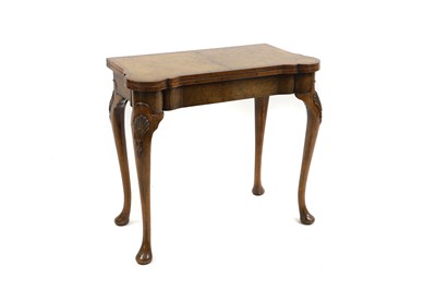 Lot 346 - A George II style walnut games table