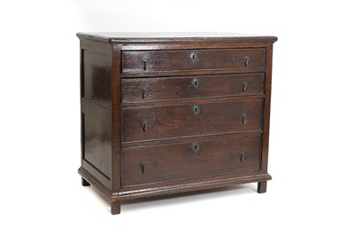 Lot 546 - An oak chest of drawers