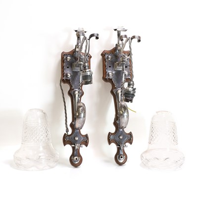 Lot 116 - A pair of Arts and Crafts silver-plated wall lights