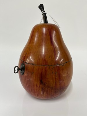 Lot 655 - A George III fruitwood pear-shaped tea caddy